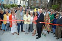 The mayor of Hayle Nick Farrar and president of the Hayle Branch of the RNLI Pauline Marks (centre) watched by members of the community cut the ribbon to officially re-open the Isis gardens in Foundry Square in Hayle The mayor of Hayle Nick Farrar and president of the Hayle Branch of the RNLI Pauline Marks (centre) watched by members of the community cut the ribbon to officially re-open the Isis gardens in Foundry Square in Hayle